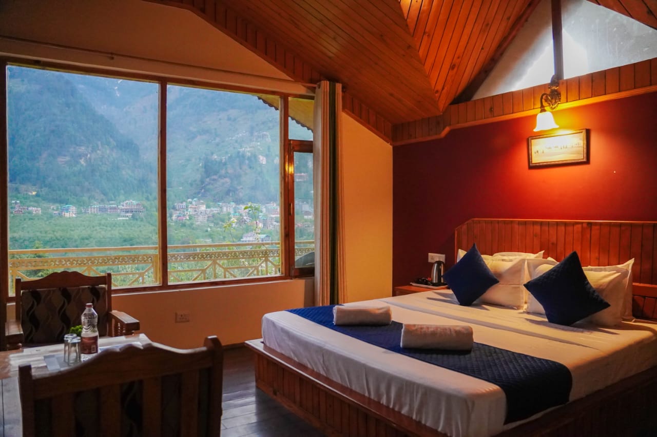 Mountain Face Cottage interior — warm wooden rooms with mountain views